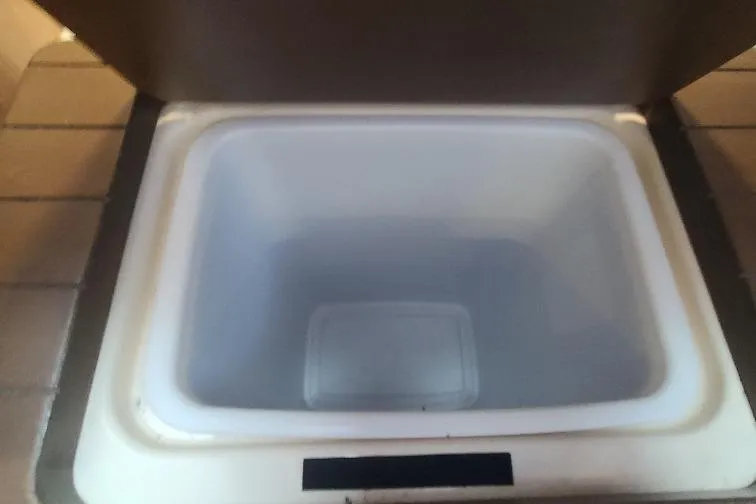 The Snapper Slapper Yacht Photos Pics Empty storage compartment on a 2014 Boston Whaler 315 Conquest Pilothouse boat.