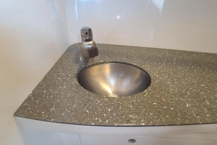 The Snapper Slapper Yacht Photos Pics Stainless steel sink on Boston Whaler 315 Conquest Pilothouse, 2014 model.