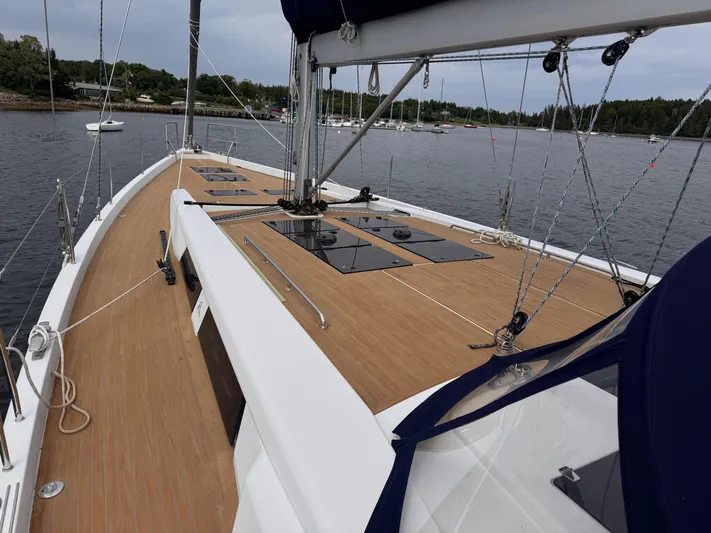 Red's Goose Yacht Photos Pics 2016 Hanse 575 yacht deck with sleek design, sailing on calm waters.