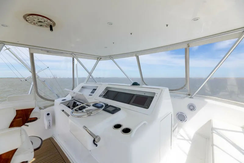 Beer-a-cuda Yacht Photos Pics Interior helm of 2005 Viking 48 Convertible yacht with ocean view.