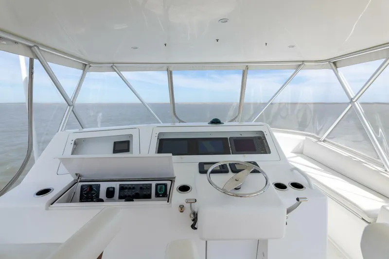 Beer-a-cuda Yacht Photos Pics 2005 Viking 48 Convertible yacht helm with ocean view.