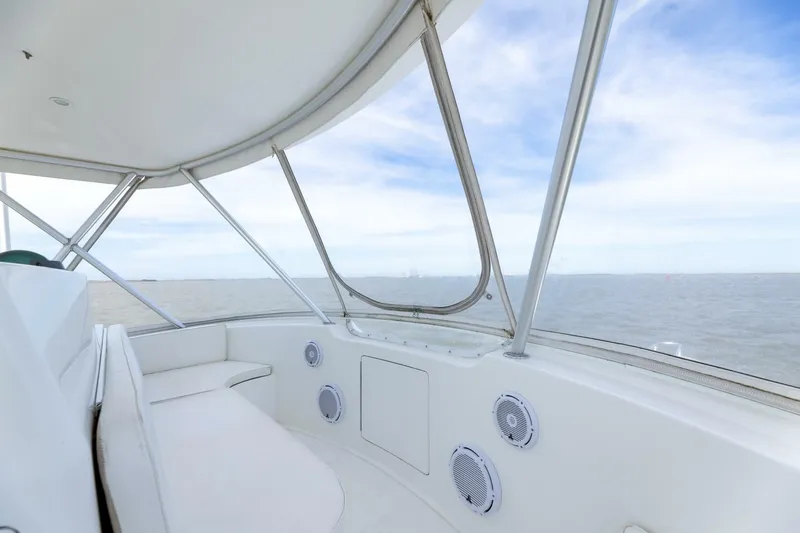 Beer-a-cuda Yacht Photos Pics 2005 Viking 48 Convertible yacht interior with ocean view and seating area.