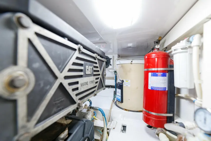 Beer-a-cuda Yacht Photos Pics Engine room of 2005 Viking 48 Convertible yacht with CAT marine power system.