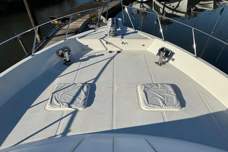 Mariner Yacht Photos Pics 2006 President 63 Pilot House yacht deck with hatches and railing.