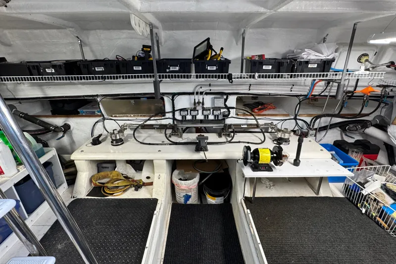 Mariner Yacht Photos Pics Interior of a 2006 President Legend 630 Pilothouse with organized storage and equipment.