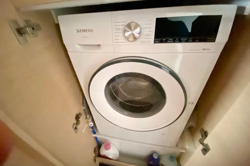  Yacht Photos Pics Siemens washing machine in a 2024 Fountaine Pajot Catamaran Aura 51 interior.