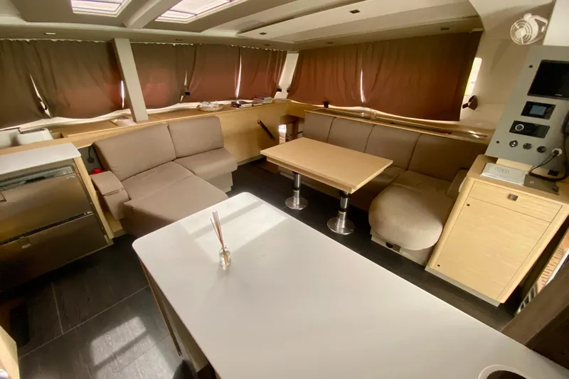  Yacht Photos Pics Luxurious interior of 2024 Fountaine Pajot Catamaran Aura 51 with modern furnishings.