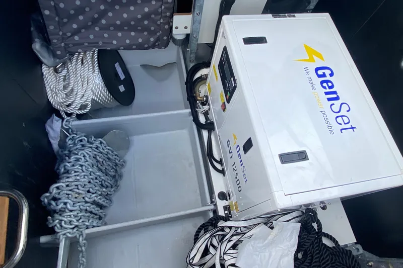  Yacht Photos Pics Storage compartment of 2024 Fountaine Pajot Catamaran Aura 51 with GenSet generator and ropes.