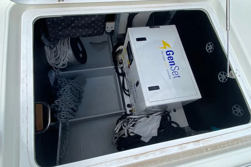  Yacht Photos Pics Storage compartment of 2024 Fountaine Pajot Catamaran Aura 51 with GenSet generator and ropes.