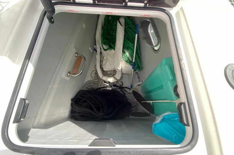  Yacht Photos Pics Storage compartment of 2024 Fountaine Pajot Catamaran Aura 51 with ropes and equipment.