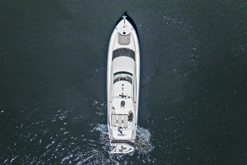  Yacht Photos Pics Aerial view of a Lazzara yacht cruising on calm waters.
