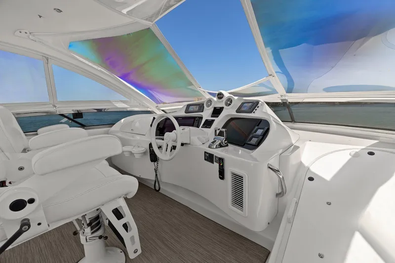  Yacht Photos Pics Luxurious Lazzara yacht helm with modern controls and panoramic ocean view.