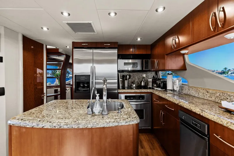  Yacht Photos Pics Luxurious Lazzara yacht kitchen with granite countertops and stainless steel appliances.