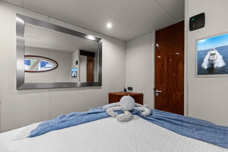  Yacht Photos Pics Luxurious Lazzara yacht cabin with elegant decor and plush bedding.