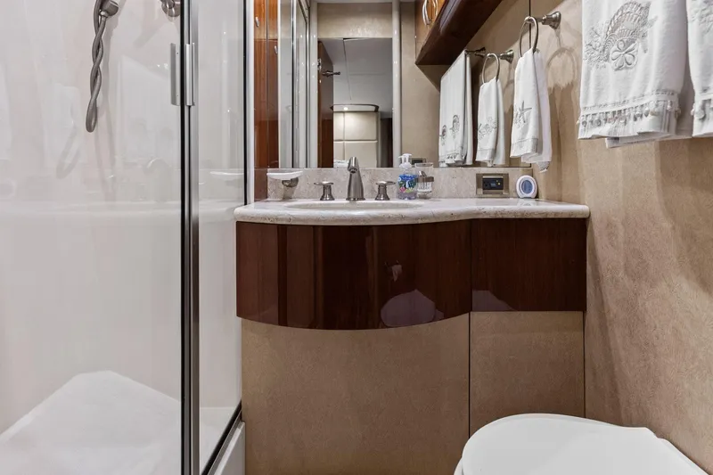  Yacht Photos Pics Luxurious Lazzara yacht bathroom with elegant fixtures and modern design.