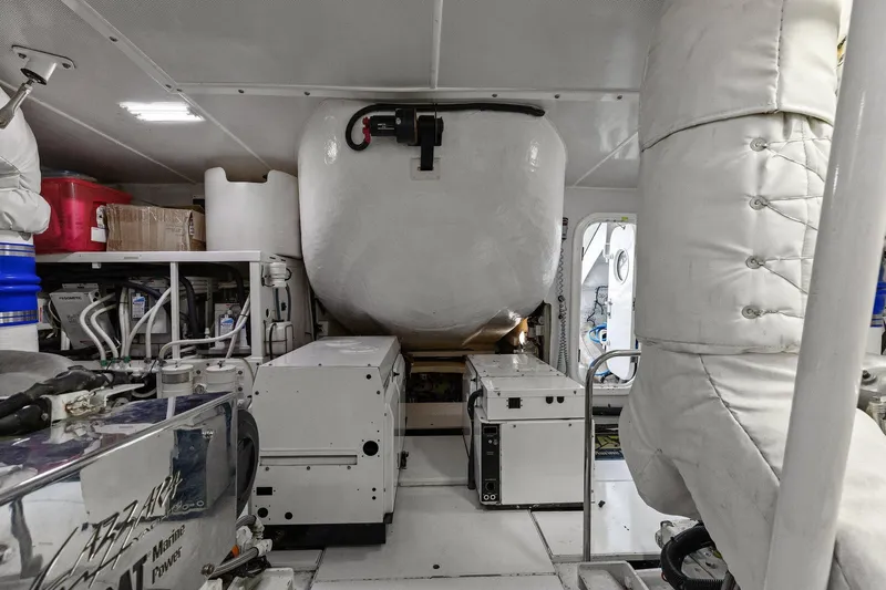  Yacht Photos Pics Engine room of a Lazzara yacht with machinery and equipment.