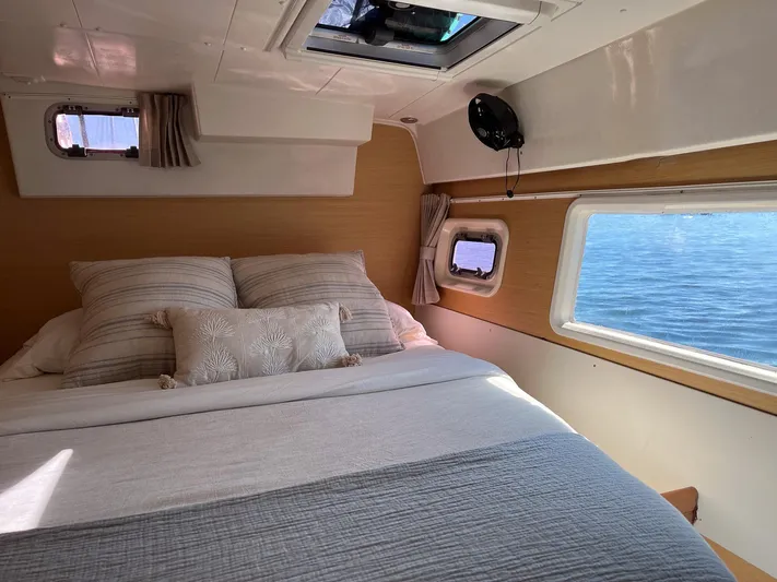  Yacht Photos Pics Cozy bedroom in 2009 Lagoon 420 yacht with ocean view through windows.