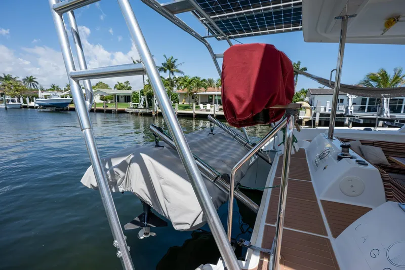  Yacht Photos Pics Lagoon 420 catamaran docked, featuring solar panels and covered equipment, 2009 model.