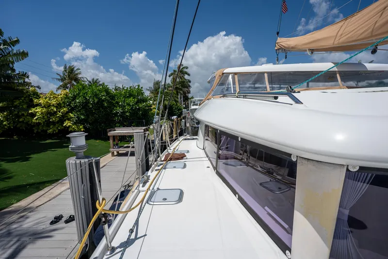  Yacht Photos Pics 2009 Lagoon 420 yacht docked under a clear blue sky.