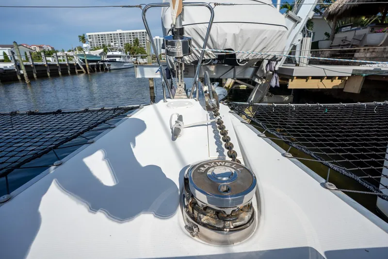  Yacht Photos Pics Bow of 2009 Lagoon 420 yacht docked at marina, featuring anchor chain and winch.