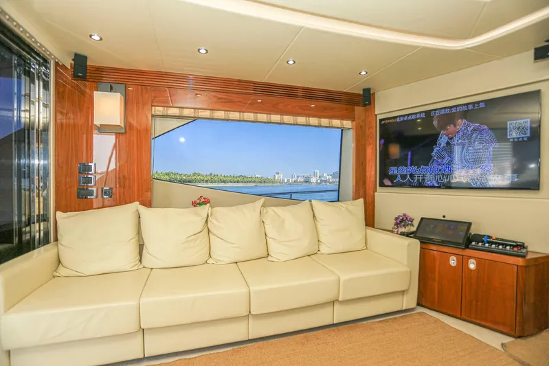  Yacht Photos Pics Luxurious interior of 2015 Sunseeker 75 Yacht with plush seating and entertainment system.