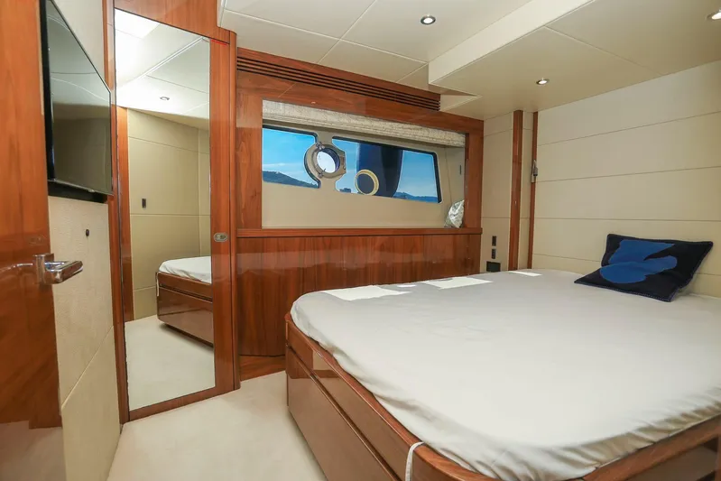  Yacht Photos Pics Luxurious Sunseeker 75 Yacht 2015 bedroom with elegant wood finishes and modern design.