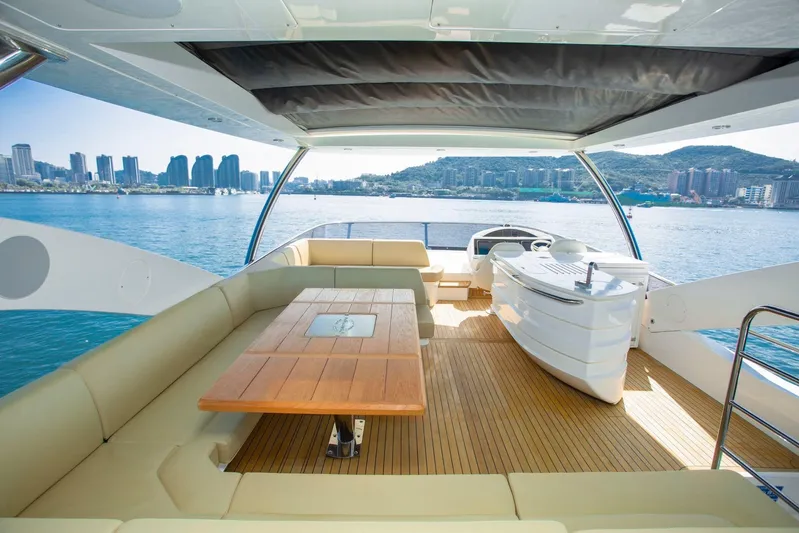  Yacht Photos Pics Luxurious 2015 Sunseeker 75 Yacht interior with city skyline and ocean view.