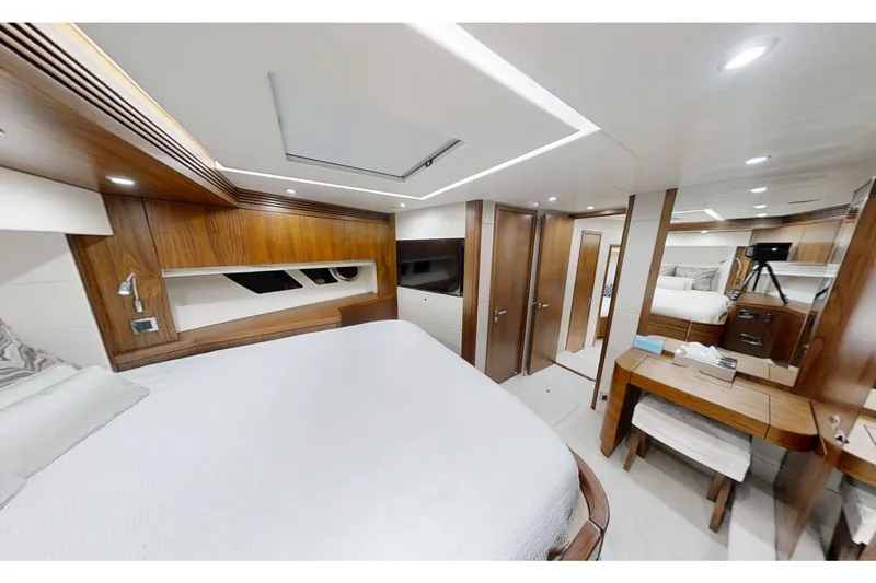 Glasax Yacht Photos Pics Luxurious interior of 2016 Sunseeker 75 Yacht with elegant wood finishes and modern amenities.