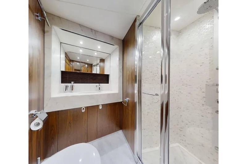 Glasax Yacht Photos Pics Luxurious bathroom in 2016 Sunseeker 75 Yacht with modern fixtures and elegant design.