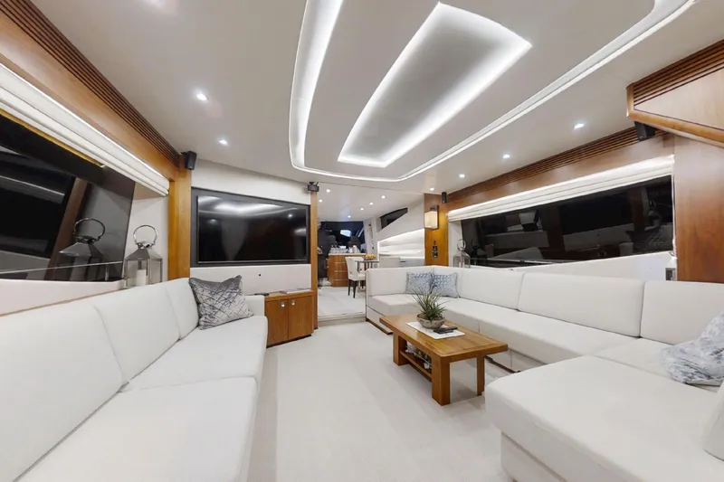 Glasax Yacht Photos Pics Luxurious interior of 2016 Sunseeker 75 Yacht with modern seating and elegant lighting.