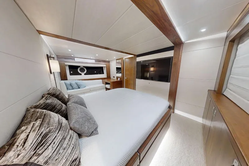 Glasax Yacht Photos Pics Luxurious interior of 2016 Sunseeker 75 Yacht with elegant bedroom and modern furnishings.