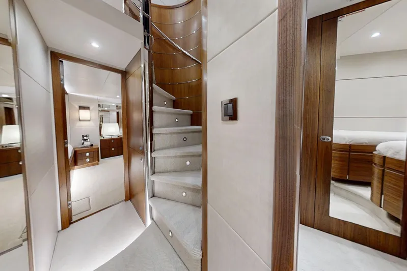 Glasax Yacht Photos Pics Luxurious interior of 2016 Sunseeker 75 Yacht featuring elegant staircase and modern design.