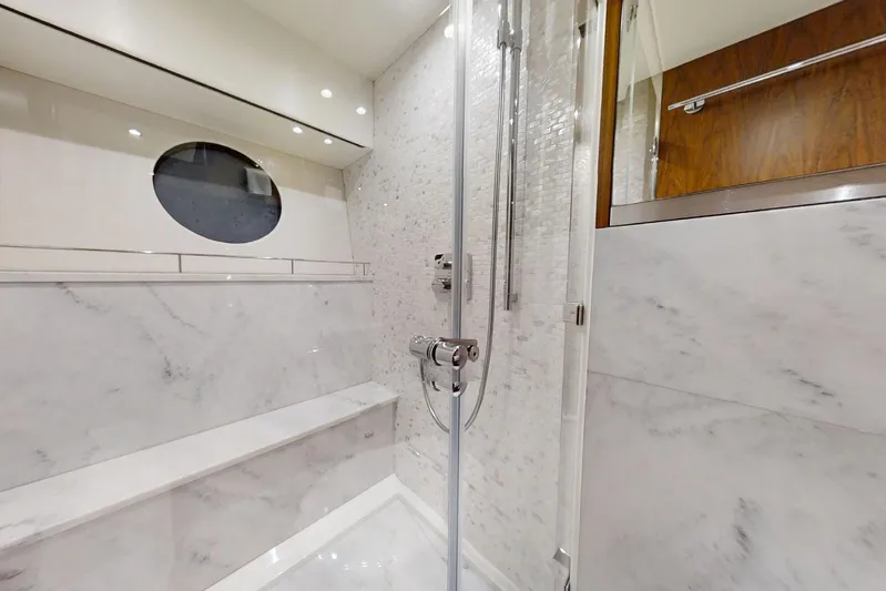 Glasax Yacht Photos Pics Luxurious marble bathroom in 2016 Sunseeker 75 Yacht with modern shower design.