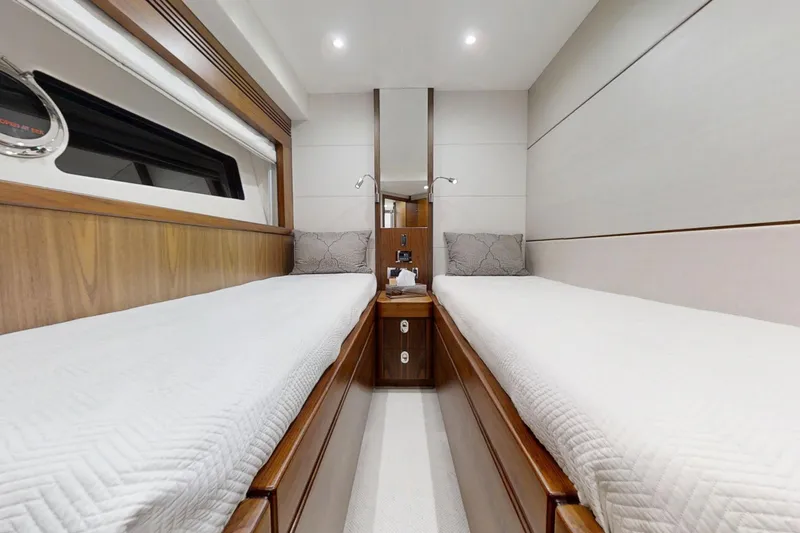 Glasax Yacht Photos Pics Luxurious twin cabin interior of 2016 Sunseeker 75 Yacht with elegant wood finish.