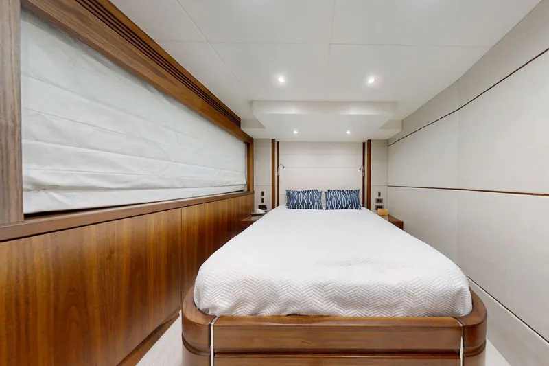 Glasax Yacht Photos Pics Luxurious bedroom interior of 2016 Sunseeker 75 Yacht with modern design and elegant wood finishes.