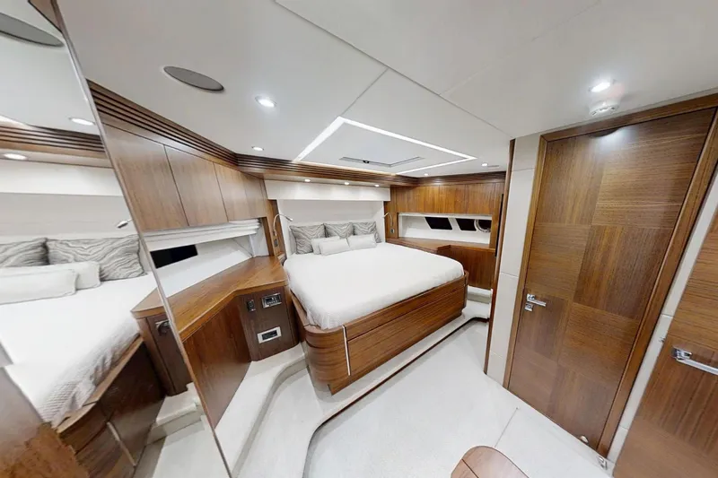Glasax Yacht Photos Pics Luxurious interior of 2016 Sunseeker 75 Yacht, featuring elegant wood finishes and modern design.