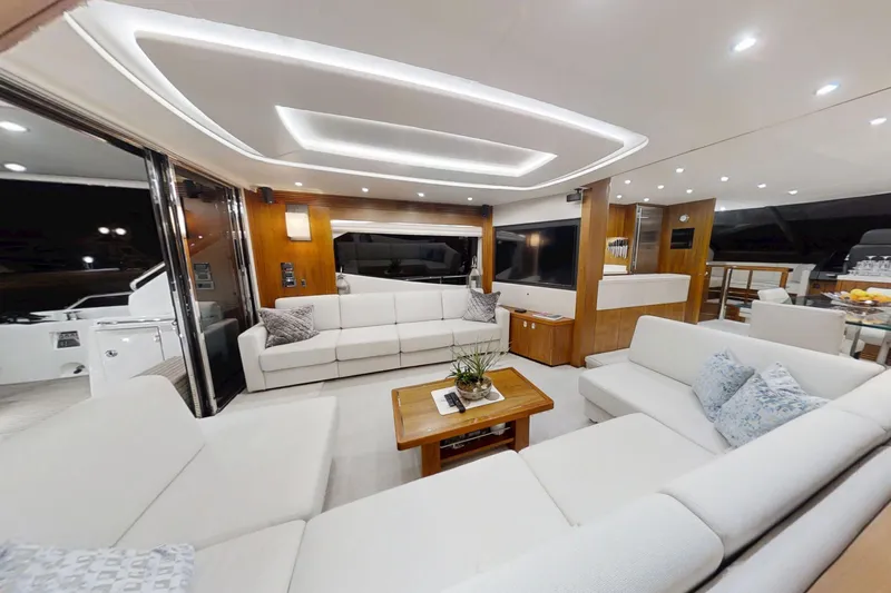 Glasax Yacht Photos Pics Luxurious interior of 2016 Sunseeker 75 Yacht with modern seating and elegant lighting.