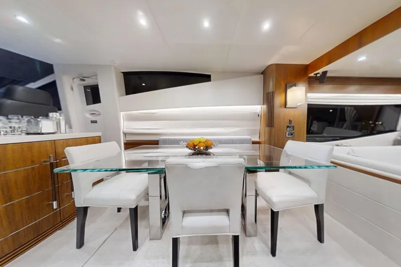 Glasax Yacht Photos Pics Luxurious interior of 2016 Sunseeker 75 Yacht with elegant dining area and modern decor.