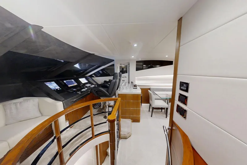 Glasax Yacht Photos Pics Luxurious interior of 2016 Sunseeker 75 Yacht with modern helm and elegant seating area.