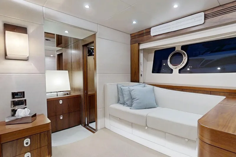 Glasax Yacht Photos Pics Luxurious interior of 2016 Sunseeker 75 Yacht with elegant wood finishes and plush seating.