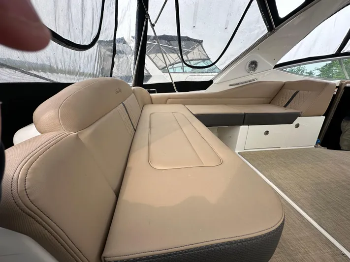  Yacht Photos Pics 2017 Sea Ray Sundancer 310 interior with beige seating and modern design.