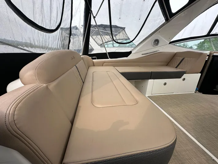 Yacht Photos Pics 2017 Sea Ray Sundancer 310 interior with beige seating and modern design.