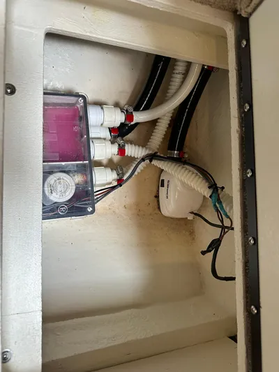  Yacht Photos Pics Electrical compartment of a 2017 Sea Ray Sundancer 310 boat, showing wiring and components.