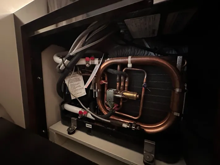  Yacht Photos Pics 2017 Sea Ray Sundancer 310 engine compartment with copper piping and wiring.