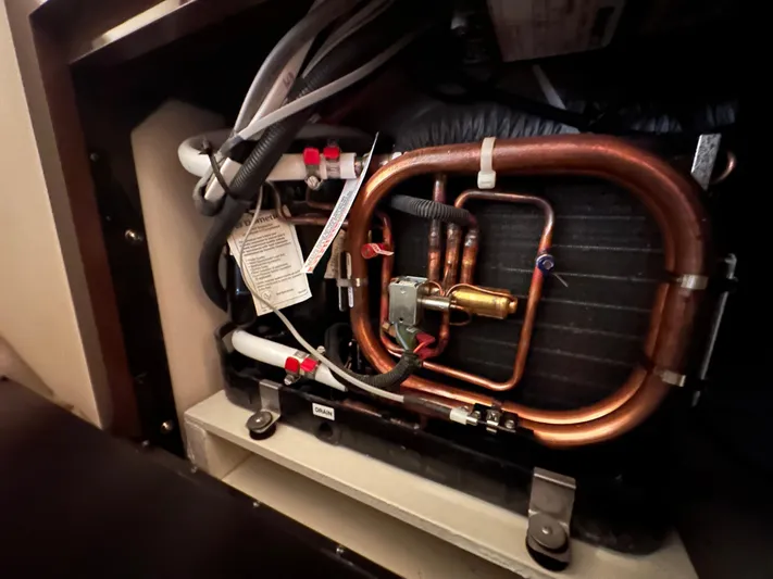  Yacht Photos Pics 2017 Sea Ray Sundancer 310 engine compartment with copper piping and wiring.