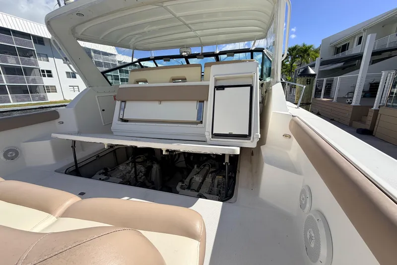 Amejaie II Yacht Photos Pics 2000 Tiara Yachts 3500 Express boat interior with open engine compartment.
