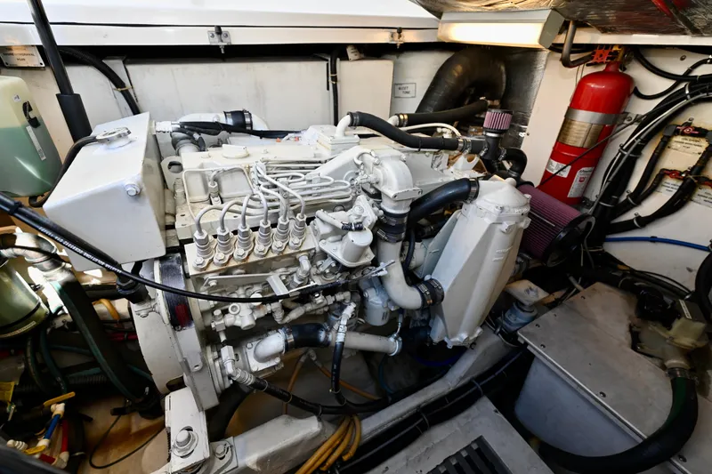 Amejaie II Yacht Photos Pics Engine room of a 2000 Tiara Yachts 3500 Express, featuring detailed mechanical components.