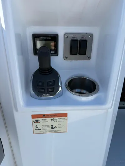 Emilia Yacht Photos Pics Control panel of 2022 Cruisers Yachts 54 Cantius with joystick and switches.