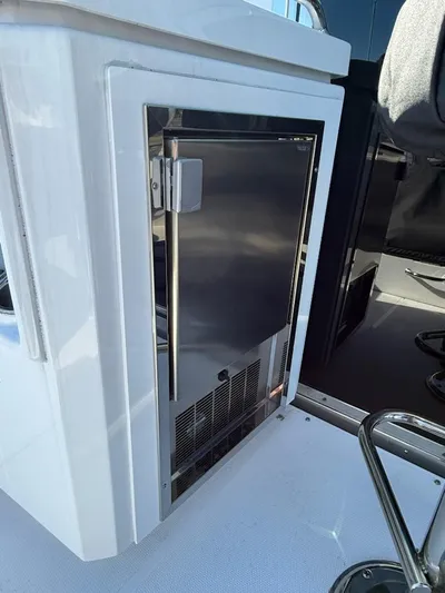 Emilia Yacht Photos Pics 2022 Cruisers Yachts 54 Cantius, stainless steel refrigerator on deck.