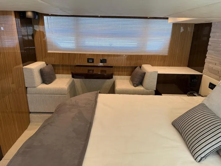 Emilia Yacht Photos Pics Luxurious interior of 2022 Cruisers Yachts 54 Cantius with modern seating and elegant decor.